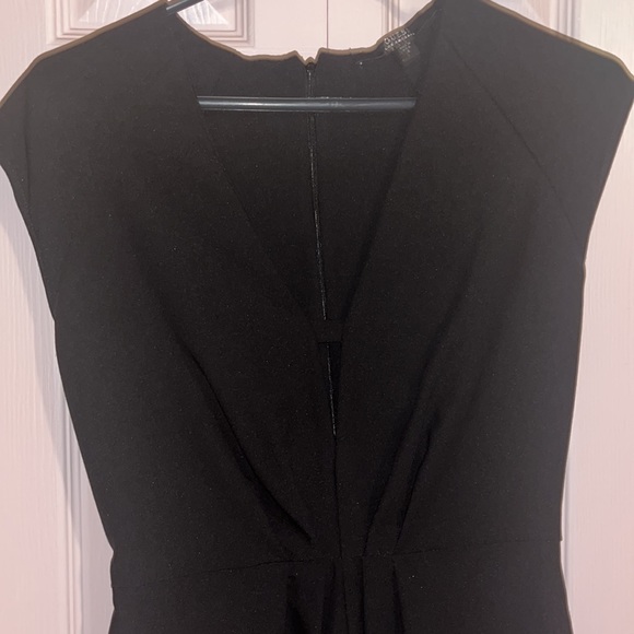 GUESS Women’s Black Romper. Low cut, V Neck. Size 4. Going out outfit. Clubwear - Picture 2 of 4